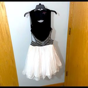 Blondes Nites, Black and white formal prom/homecoming dress, back cut out